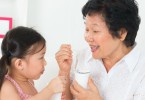 child-grandmother-eating-yogurt-1620x800