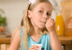 girl eating yogurt