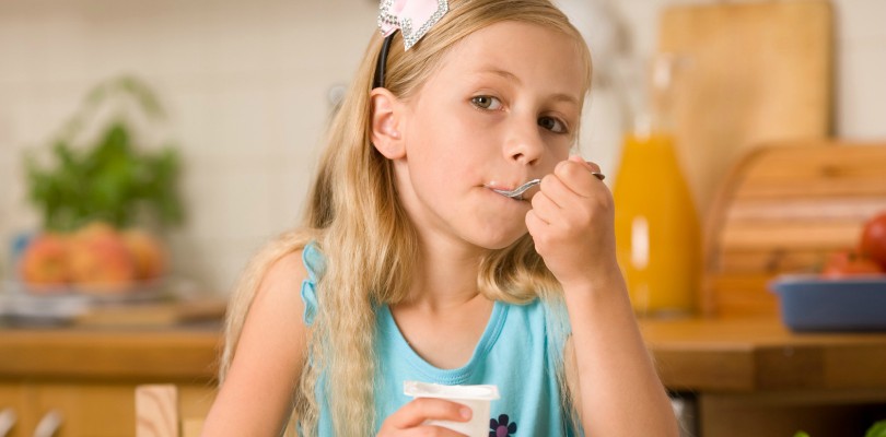 girl eating yogurt