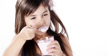 little-girl-eating-yogurt